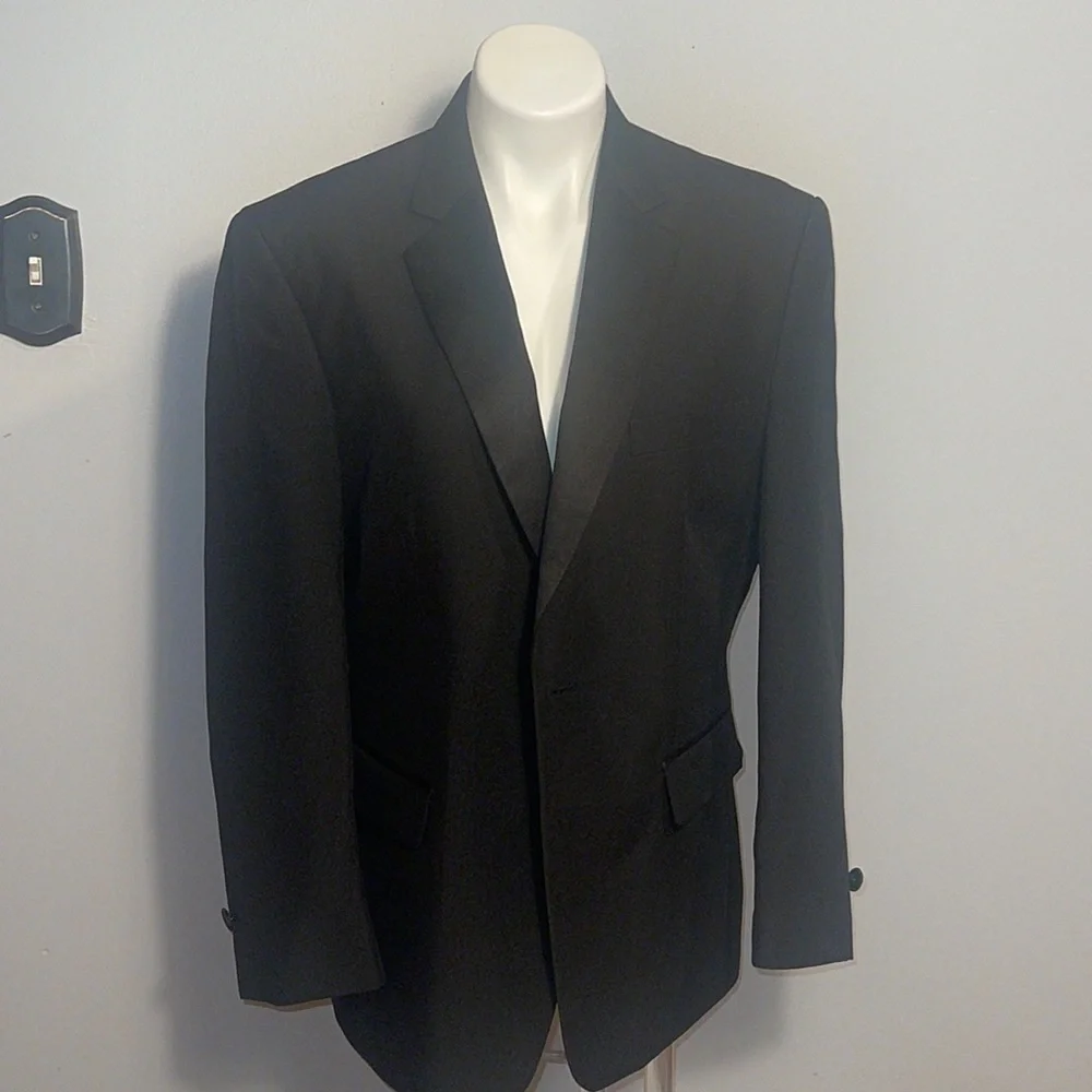 Formal Fashions men’s black tuxedo jacket and pants. Jacket 38S, Pants 34x34